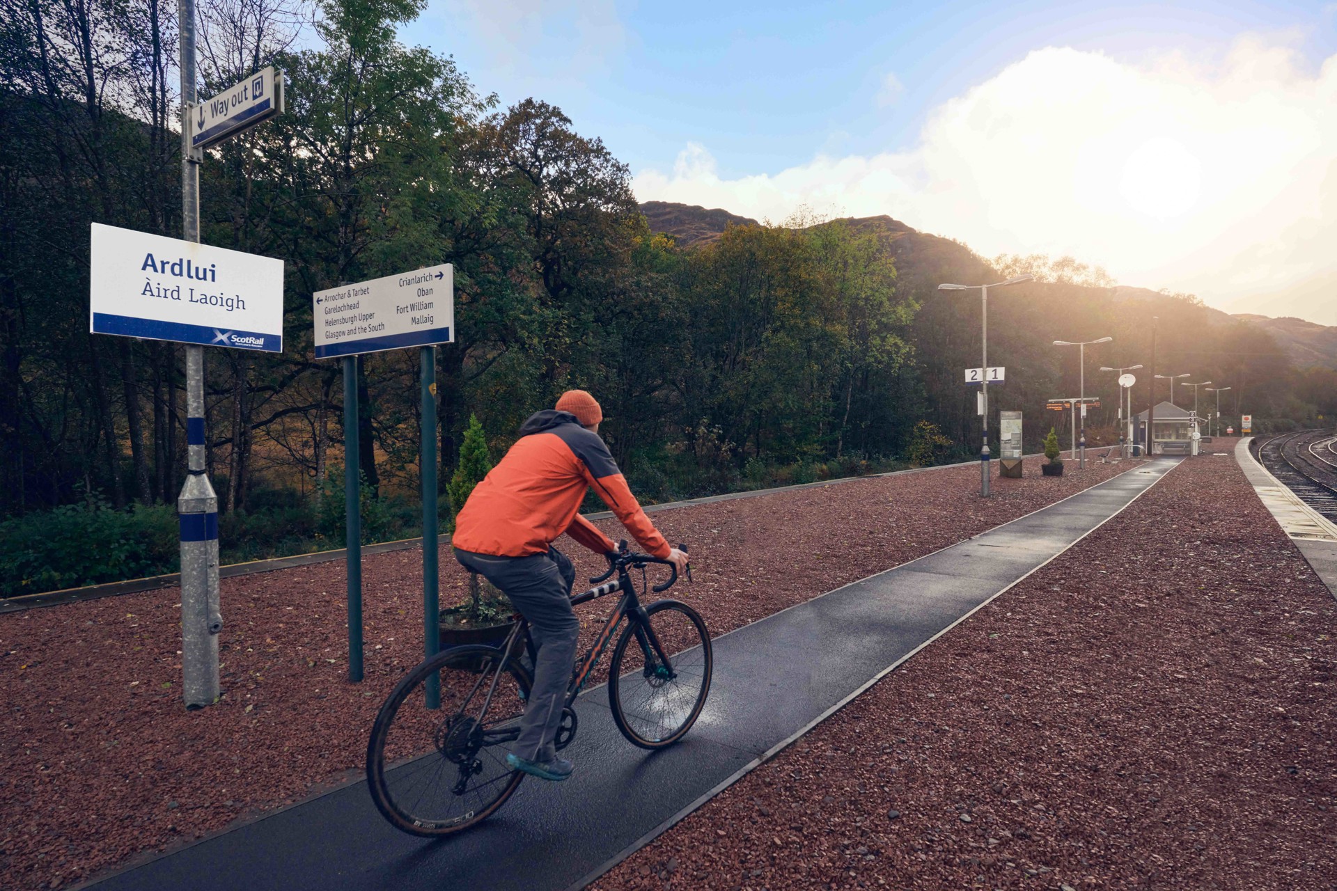 Background image - Bike at Train Station_Ardlui_StephenSweeneyPhotography